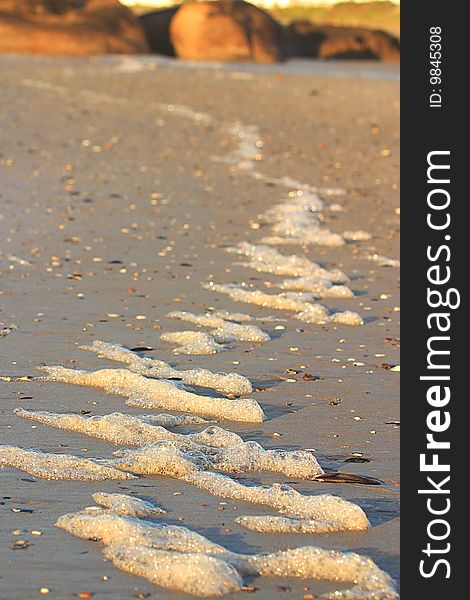 Foam on beach in Paternoster, South Africa