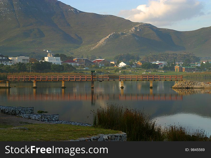 Wooden bridge over lagoon in Kleinmond, South Africa