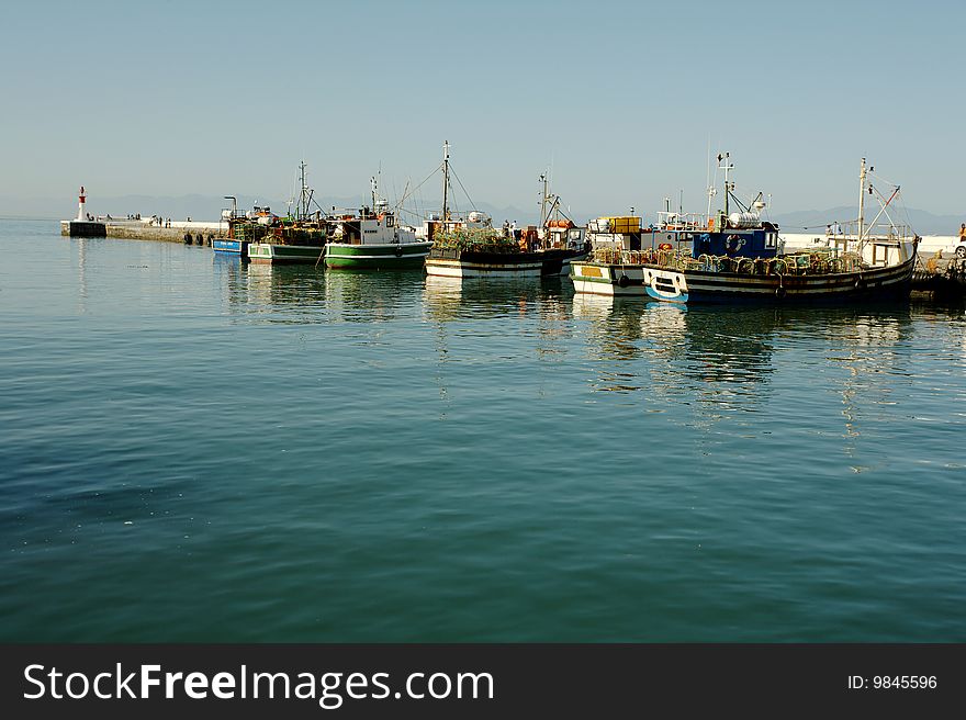 Fishing and lobster boats in Kalk Bay harbour, South Africa. Fishing and lobster boats in Kalk Bay harbour, South Africa
