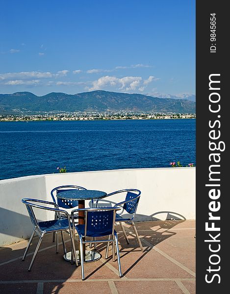 Tables and chairs near sea beach