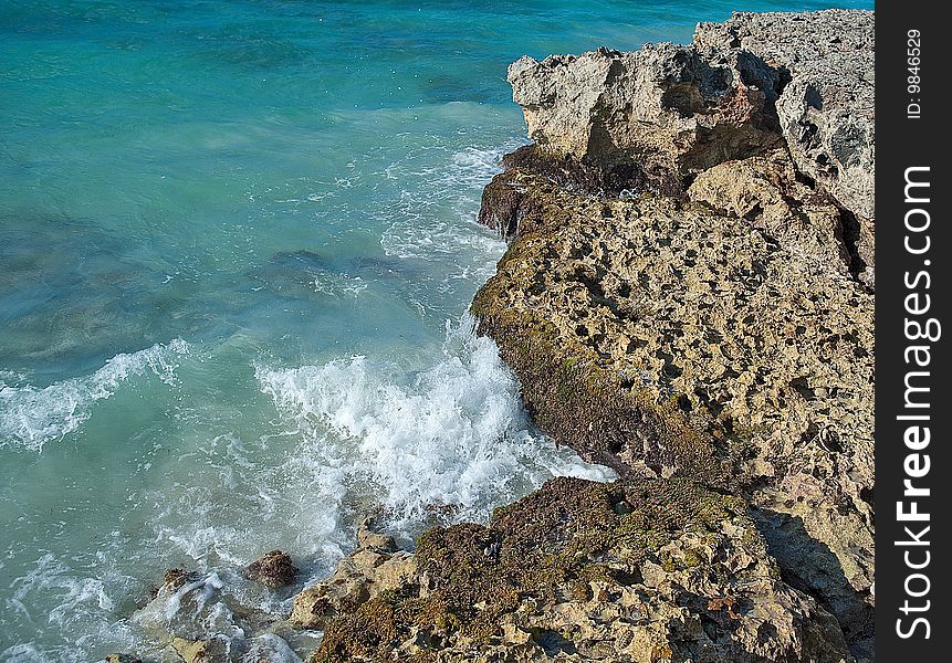 Rocky coastline with waves coming in and out. Rocky coastline with waves coming in and out