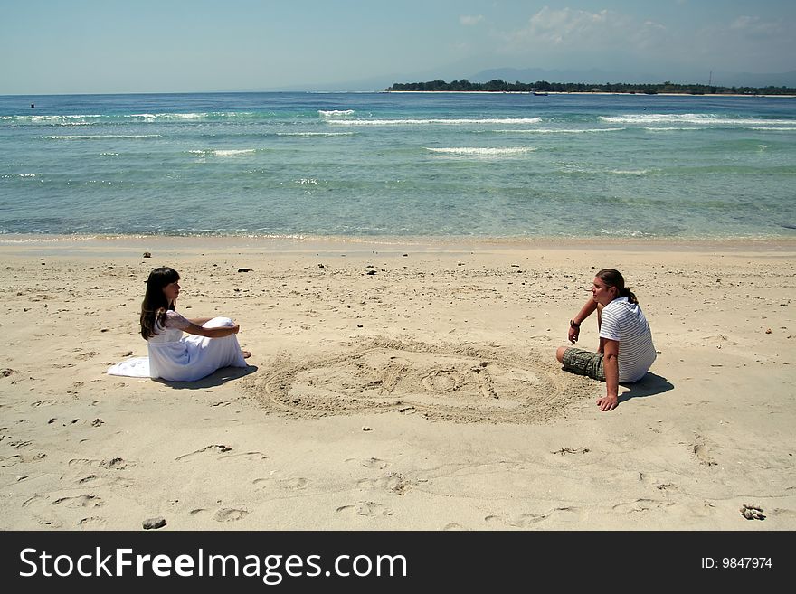 Photo of just married couple taken on the beach of Indian ocean. Photo of just married couple taken on the beach of Indian ocean