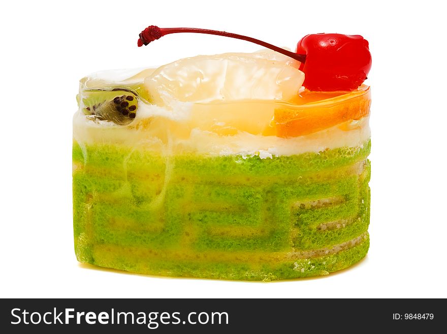 Sweet a cake with fruit on a white background