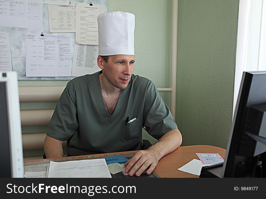 Medical theme: a doctor in a work process. Medical theme: a doctor in a work process.