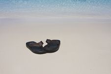 Sandals On The Beach Stock Images