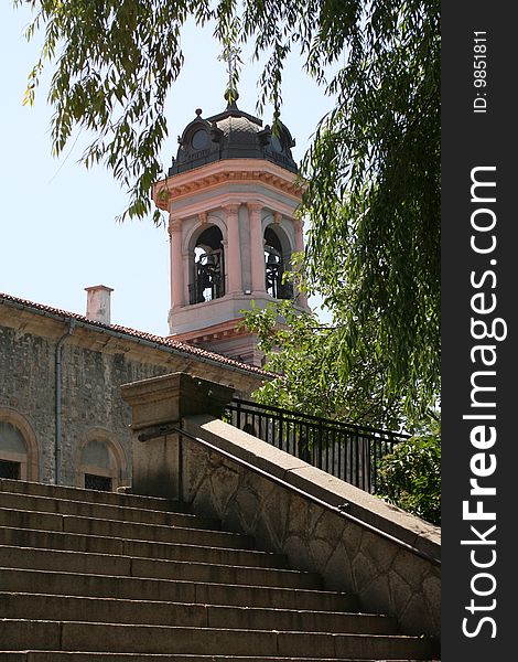 Scene with christian church and tree