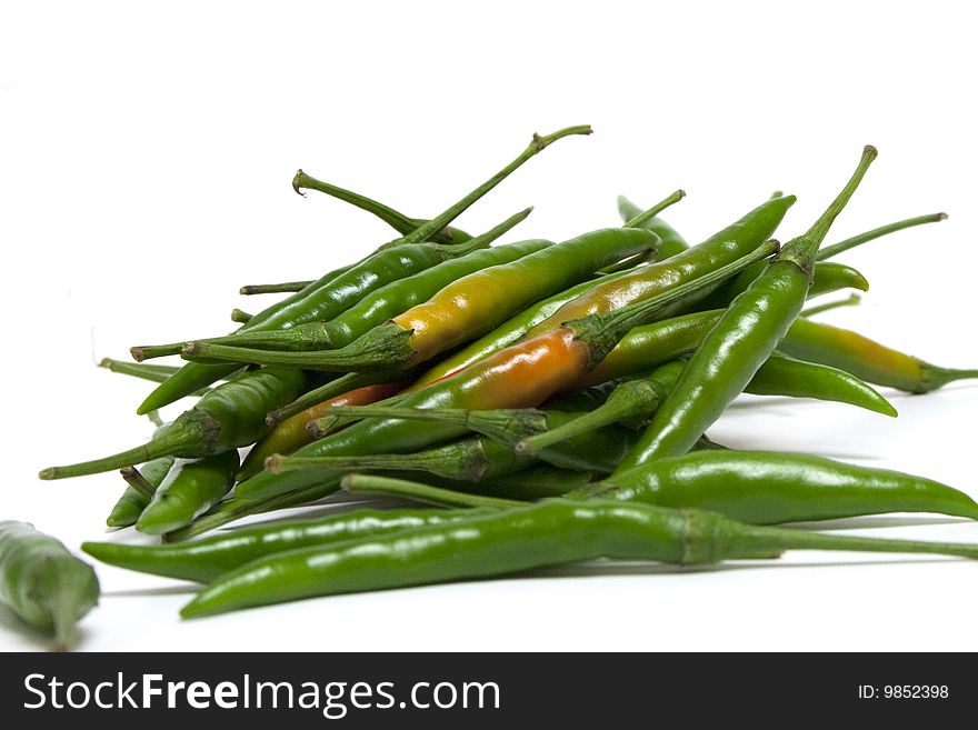 A bunch of green chili pepper. A bunch of green chili pepper