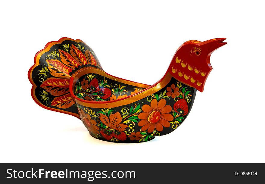 Russian wooden painted bowl in shape of wood-grouse bird isolated. Russian wooden painted bowl in shape of wood-grouse bird isolated