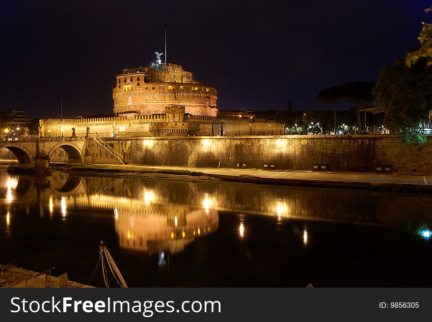 Castel Sant'Angelo in Rome by night, reflecting on Tiber river. Castel Sant'Angelo in Rome by night, reflecting on Tiber river