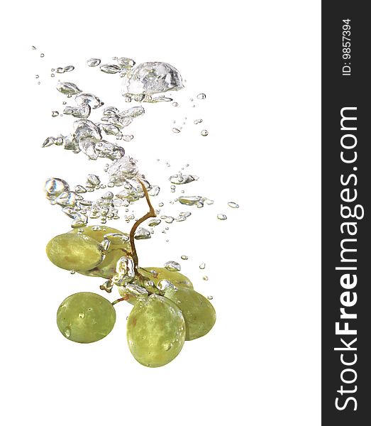 Bunch of grapes in splashing water isolated on white with clipping path. Bunch of grapes in splashing water isolated on white with clipping path