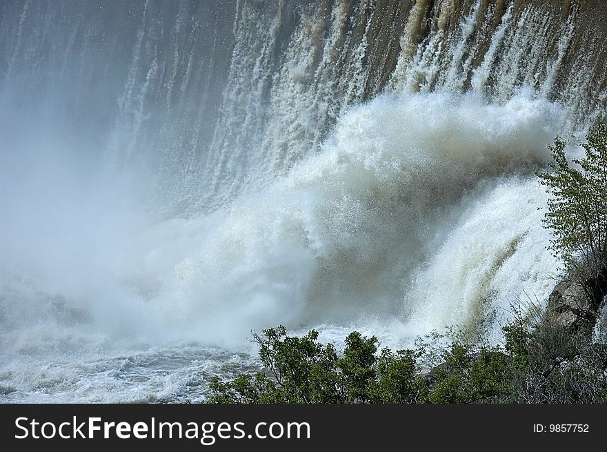 This water scene is set at the bottom of a water fall with great patterns from the fall and the subsequent mist rising back up. This water scene is set at the bottom of a water fall with great patterns from the fall and the subsequent mist rising back up.