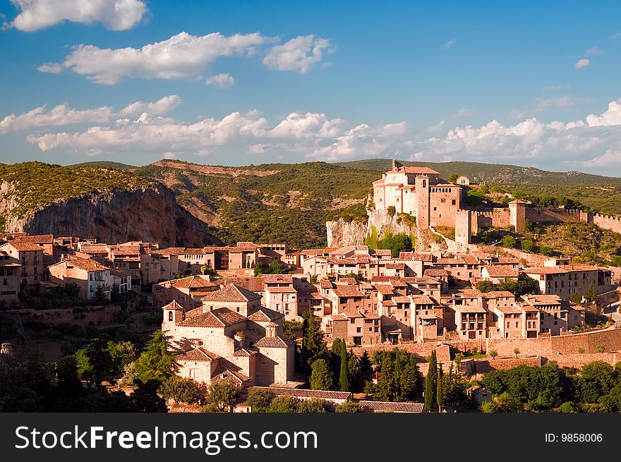 Castle overlooking small city in Spain