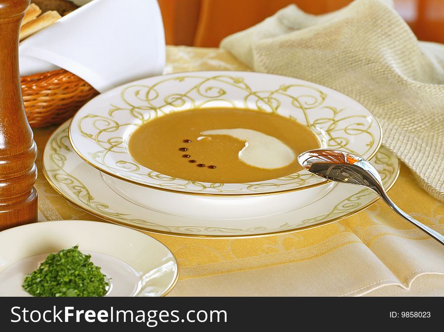 Cream soup with sauce and spices