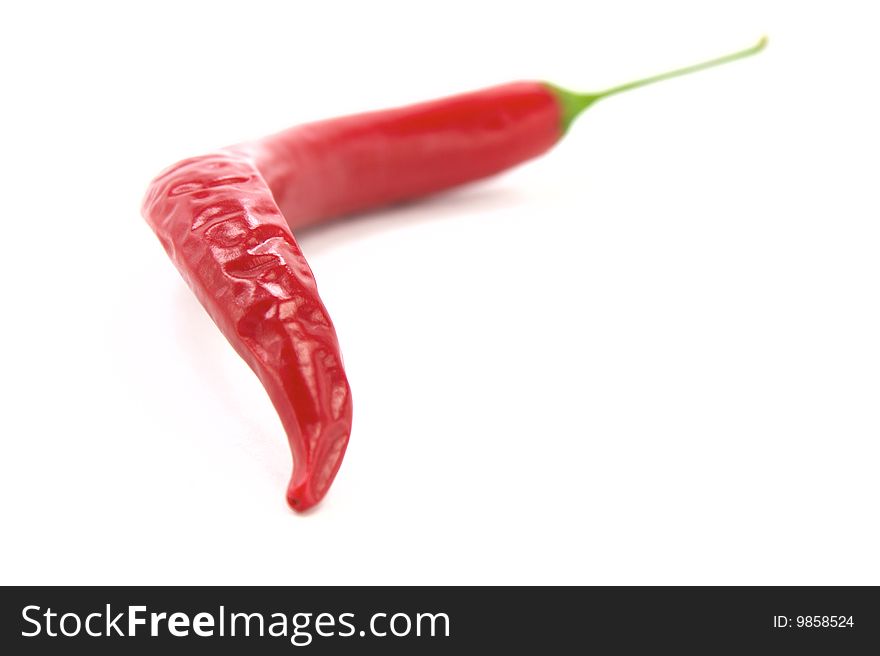 Red chili pepper on white background