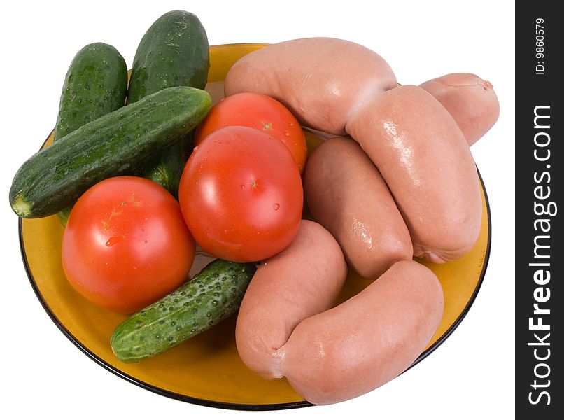 Raw Sausages With Vegetables On A Dish