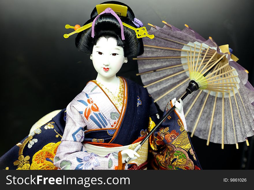 A photo of a geisha doll in japan