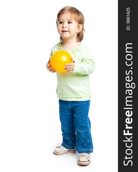 Little girl with yellow ball in hands. Isolated on white background