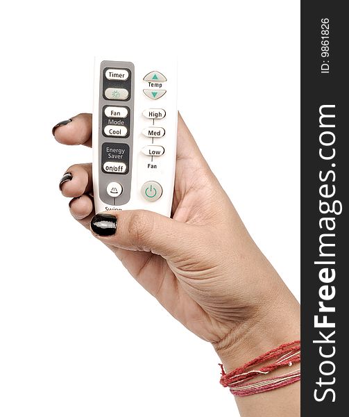 Female hand with white remote. Female hand with white remote.