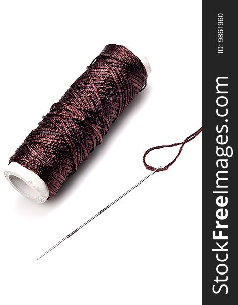 Thread spindle and needle