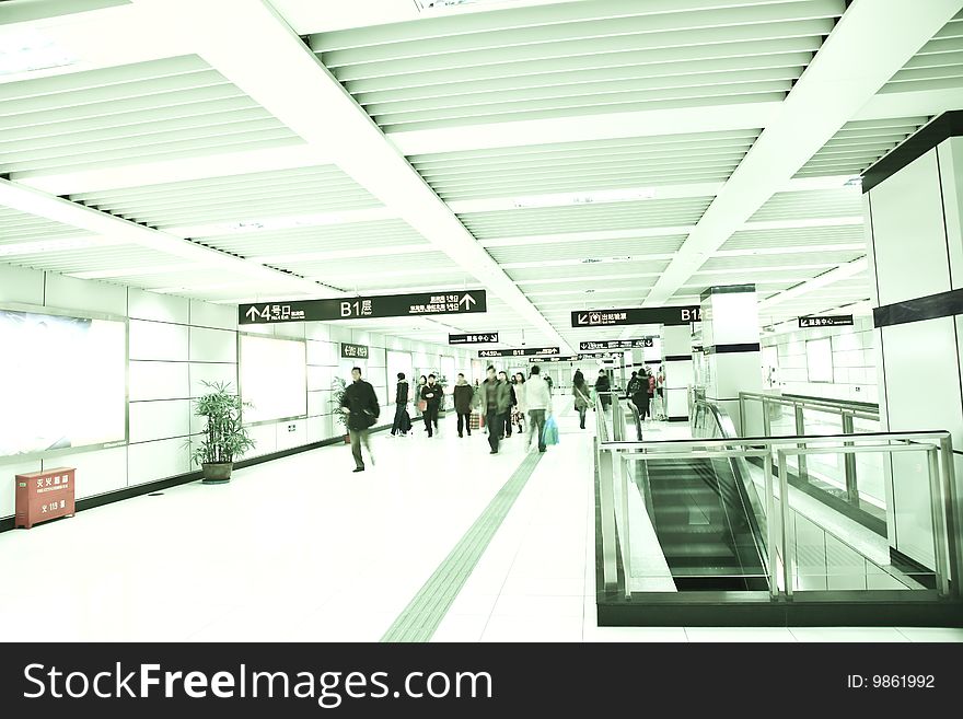 Passengers at the airport, motion blur