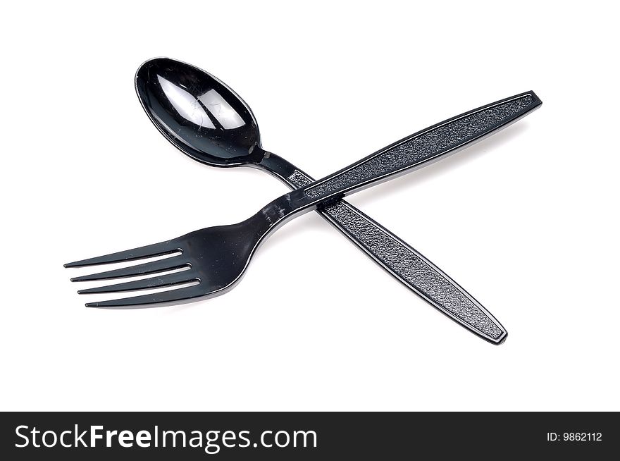 Spoon and fork isolated on white background.