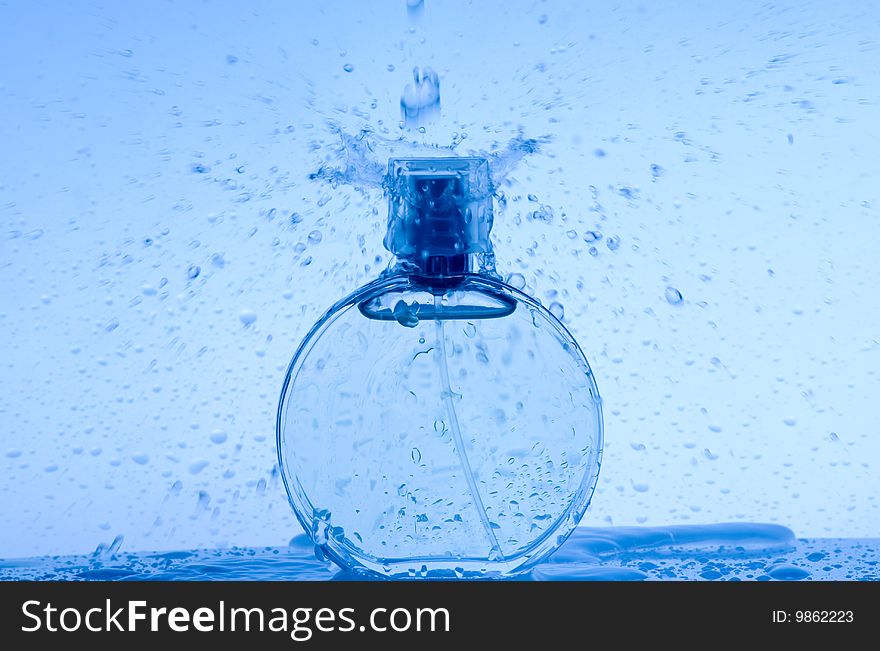 Perfume bottle and drop water