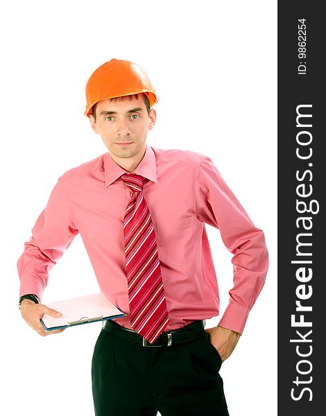 The man in a helmet with a tablet isolated a background. The man in a helmet with a tablet isolated a background