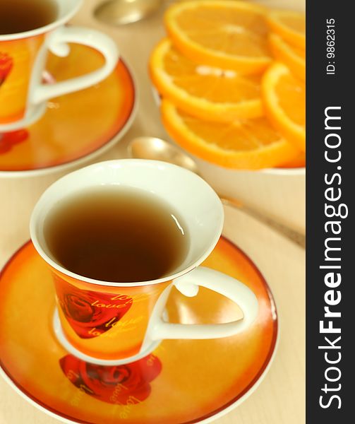 Cup of tea and oranges