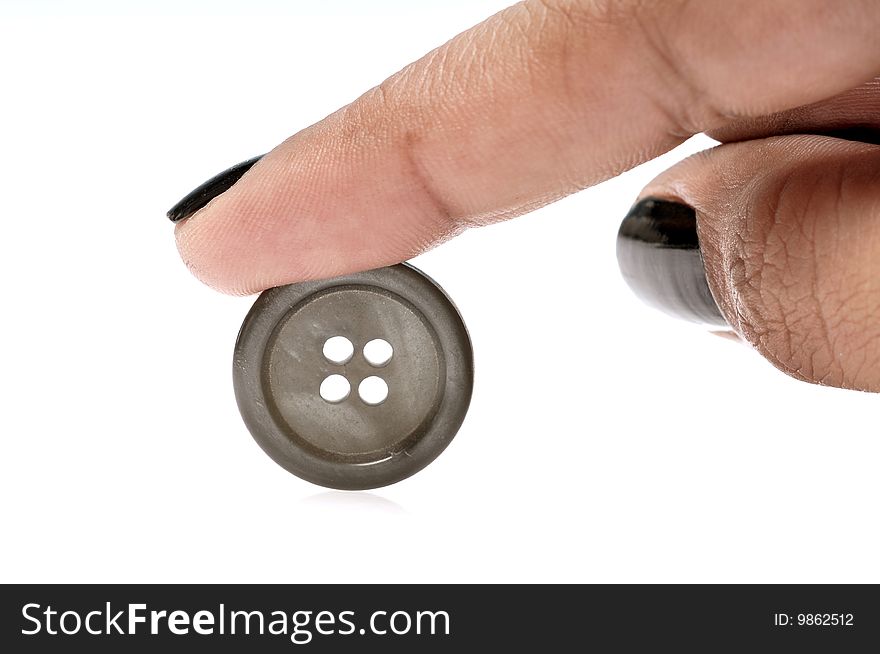 Finger closeup with button isolated on white background.