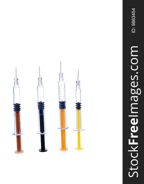 Color syringe on white  background