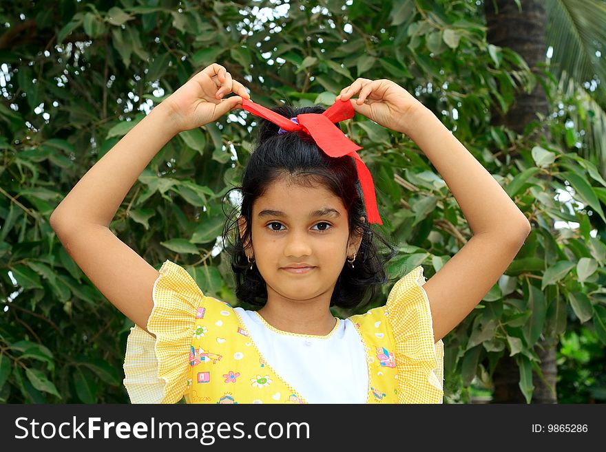 Girl Untying Her Ribbon.