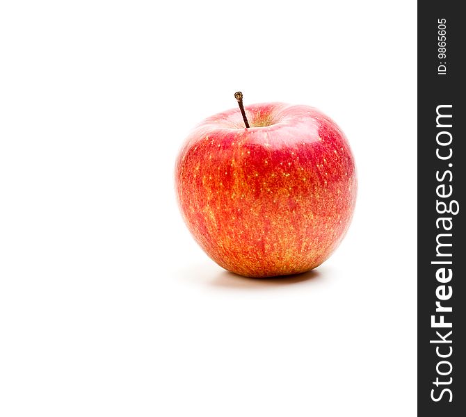 Delicious red apple on a white background