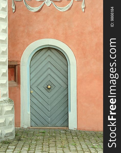 Old wooden door and stone brick wall