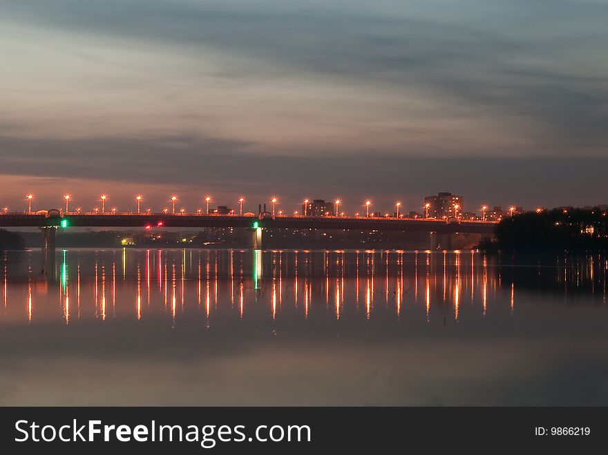 City lights reflected on the river water. City lights reflected on the river water