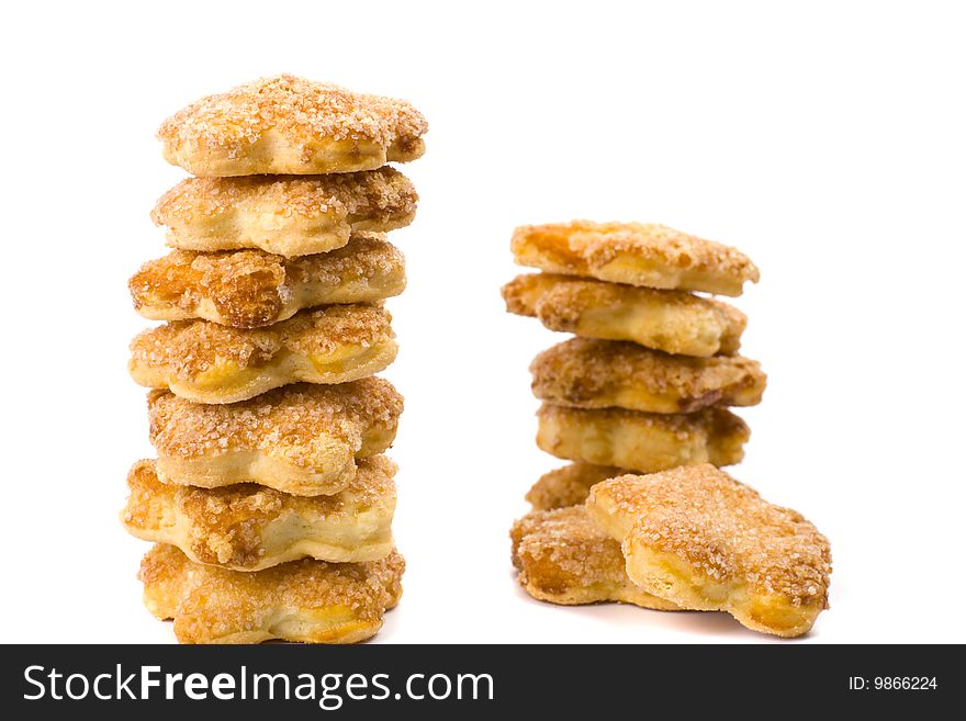 Two stacks of cookies on white background