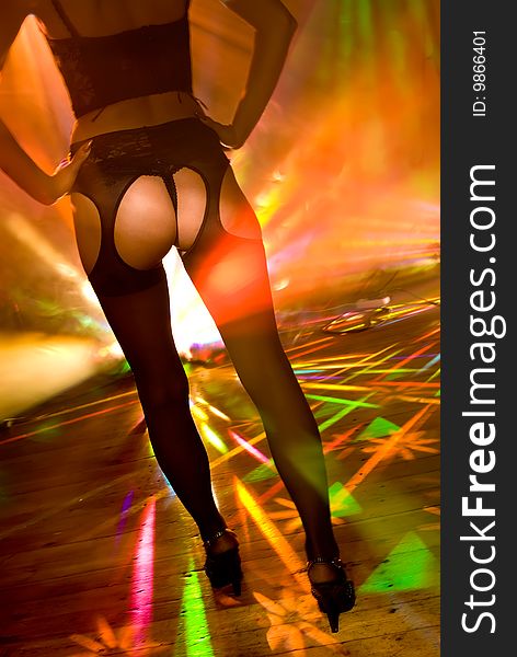 Young Woman Back Lightened By Natural Disco Lights