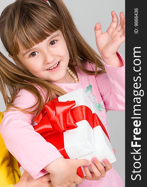 Little Girl With White Gift Box