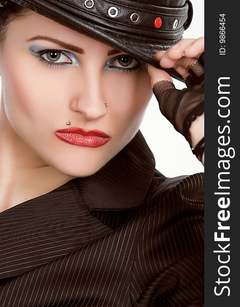 Young fashionable woman with black hat. Young fashionable woman with black hat