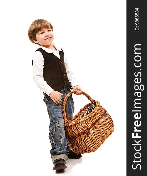 Handsome little boy holding basket, isolated on white