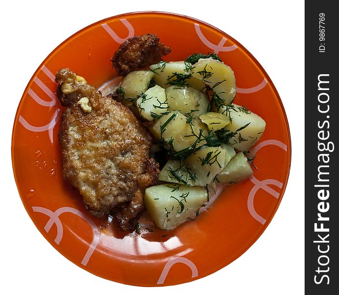 Cutlet with potatoes and dill on the orange dish, isolated object. Cutlet with potatoes and dill on the orange dish, isolated object