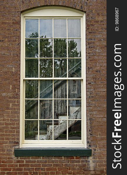 Stairwaiy in an abondoned building as seen through a window. Stairwaiy in an abondoned building as seen through a window