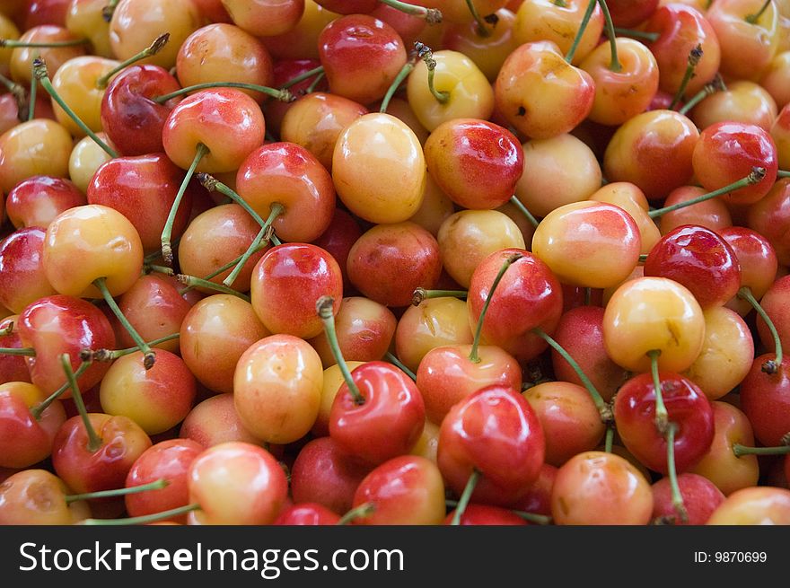 A pile of cherries in an outdoor market in Chinatown, New York City. A pile of cherries in an outdoor market in Chinatown, New York City