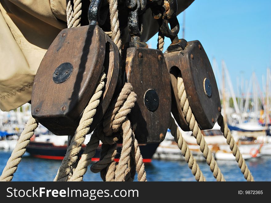 Fragment of a rigging and ropes placed on a yacht. Fragment of a rigging and ropes placed on a yacht