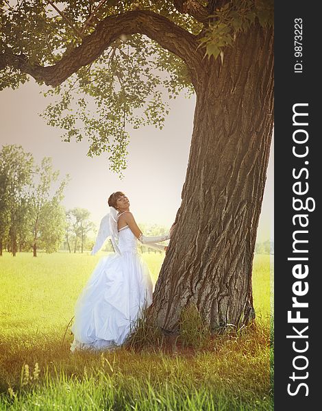 Angel bride with tree mysticism outdoor