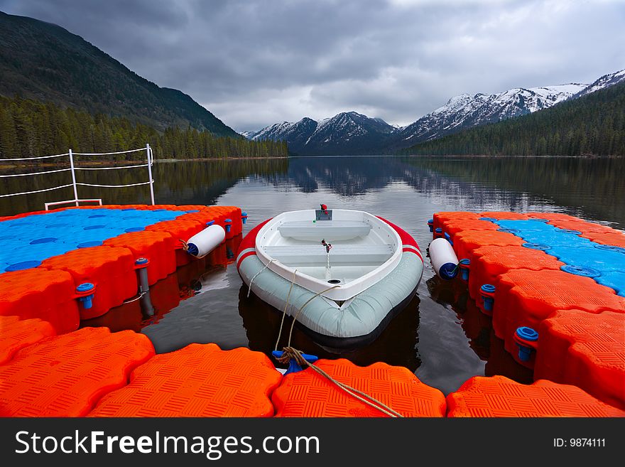 Boats on a mooring on mountain lake