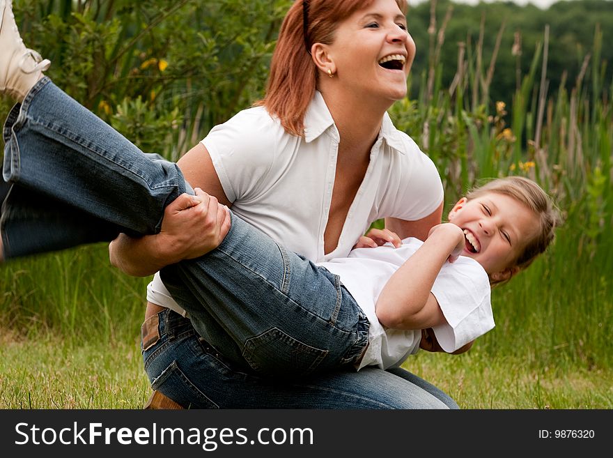 Mother and Daughter are happy in the park. Mother and Daughter are happy in the park