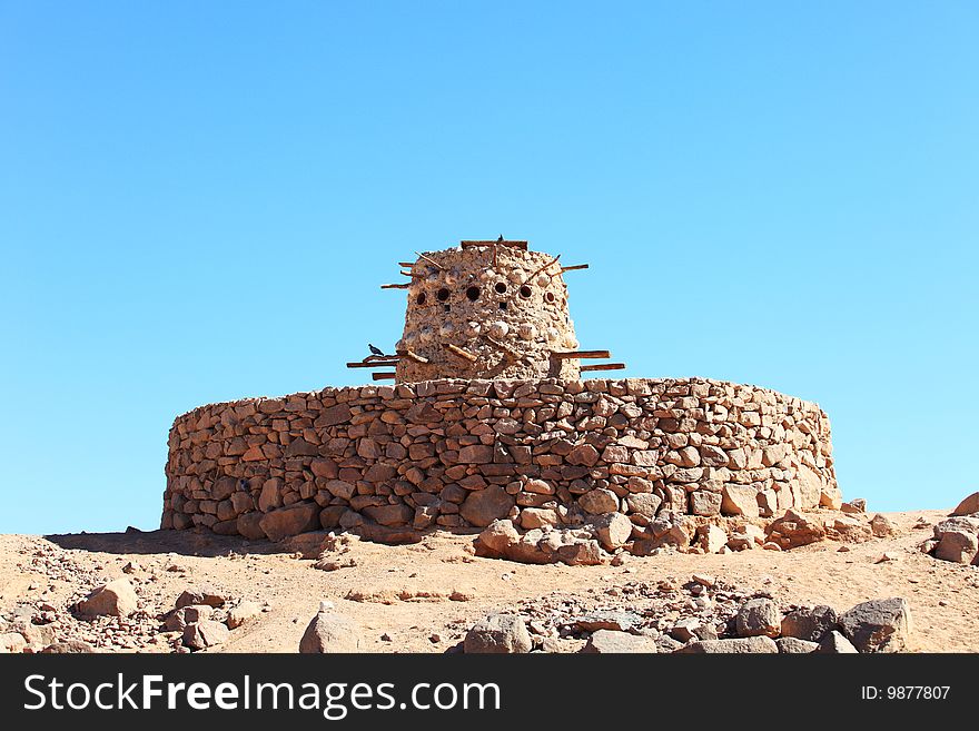 Stone pigeon house in Arabian desert, Egypt