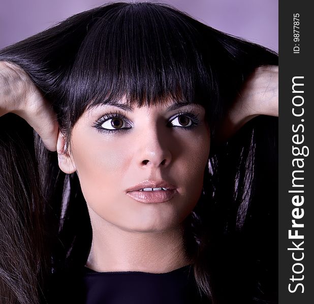 Close-up portrait of a beautiful woman, studio shot