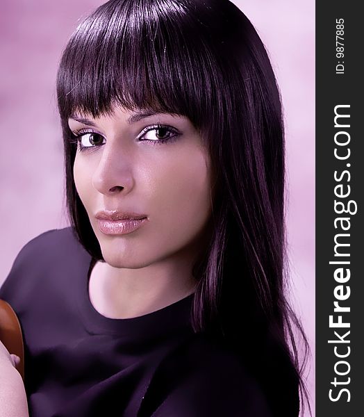 Portrait of a beautiful brunette, studio shot