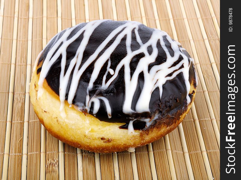 Sweet roll cake with chocolate icing